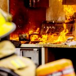 Firefighters and kitchen fire